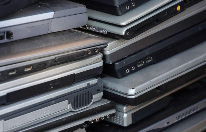 A stack of old laptops