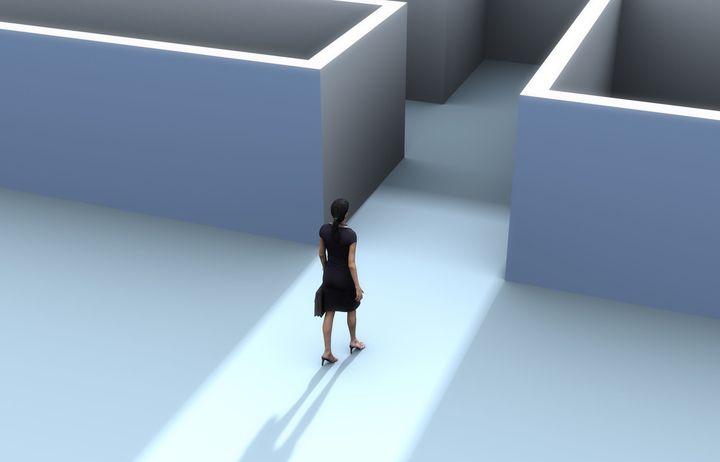 Digital illustration of a woman entering a maze