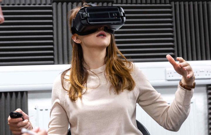 Dr Nejra Van Zalk uses virtual reality equipment