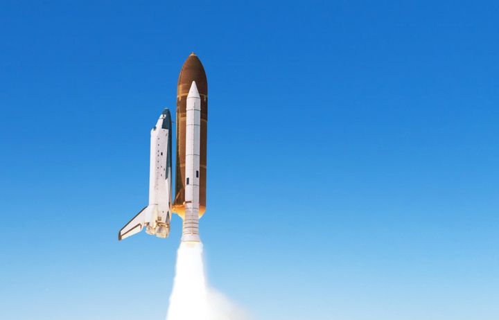 A space shuttle taking off