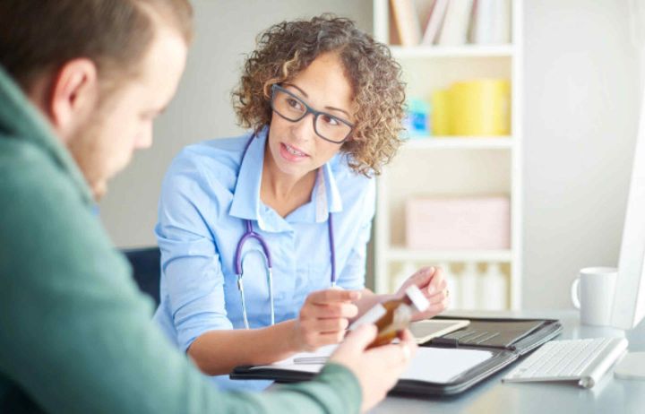 Doctor speaking to a patient