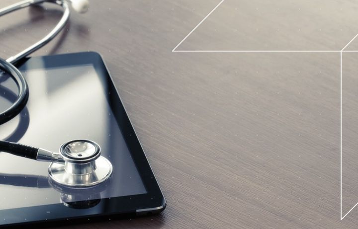 A stethoscope and digital health iPad