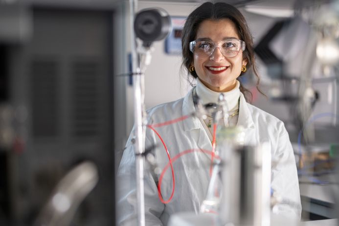 Woman smiling in lab