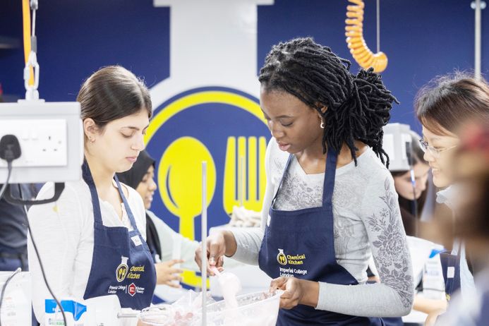 Students preparing food in the lab kitchen