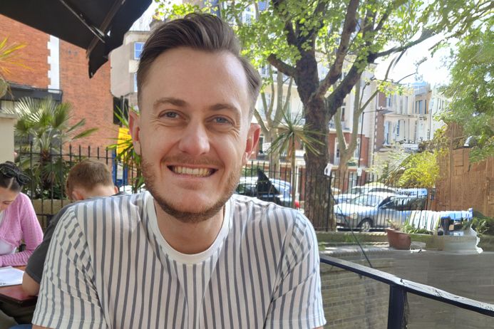 Photo of Alan Murphy sitting in pub garden smiling