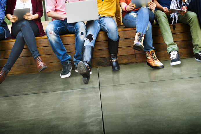 Young people sit together