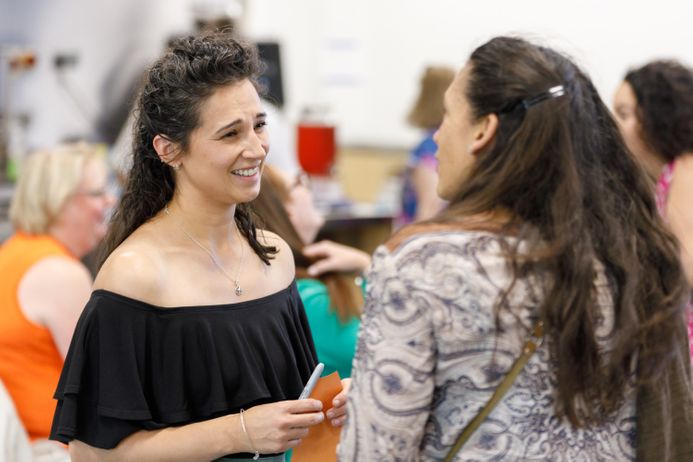 Two women talking to each other