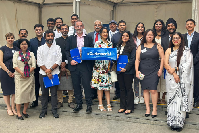 Group image of alumni at Global event in Delhi