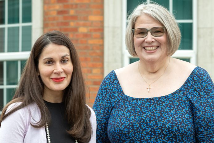 A doctor and a patient smiling