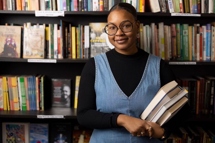 Woman holding books