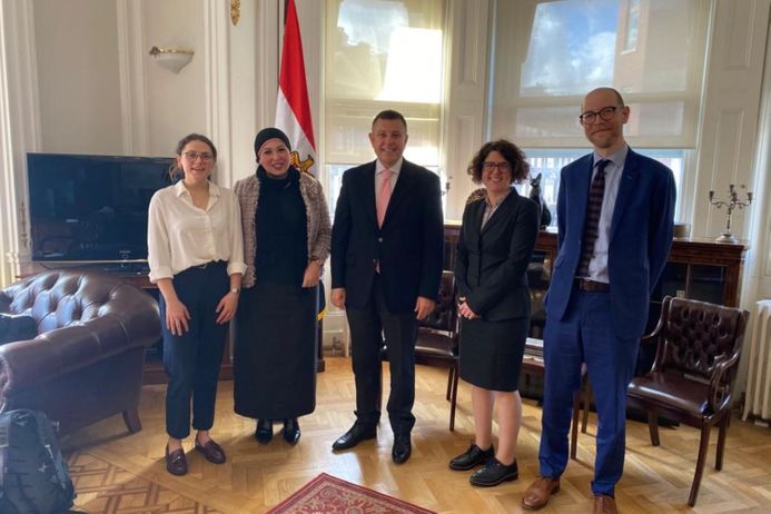 Five people standing in a line - representatives of the UK Universities Climate Network at the Egypt Embassy