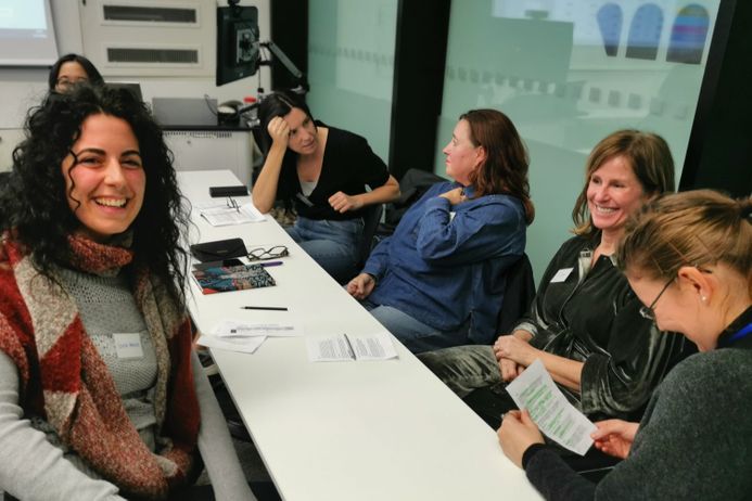 Group of people around a table in the Grantham Institute boardroom