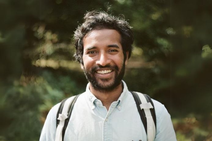 Headshot of Ravinash smiling in outdoors