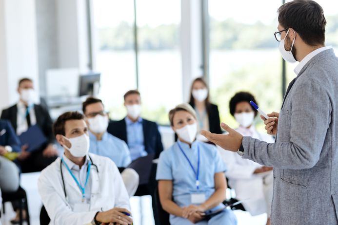 A group of nurses and doctors in a class