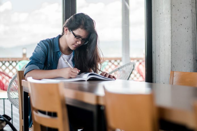 Student working at a table