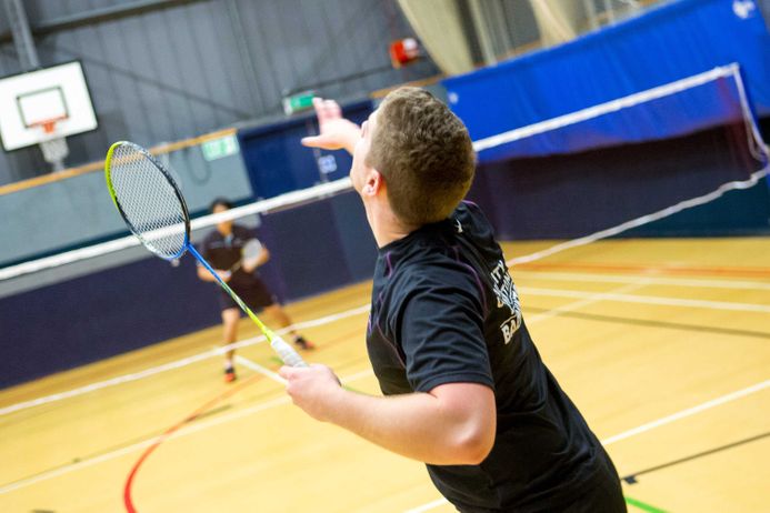 man playing badminton