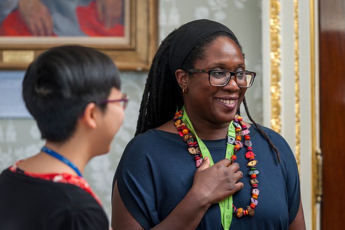 Woman with glasses smiling