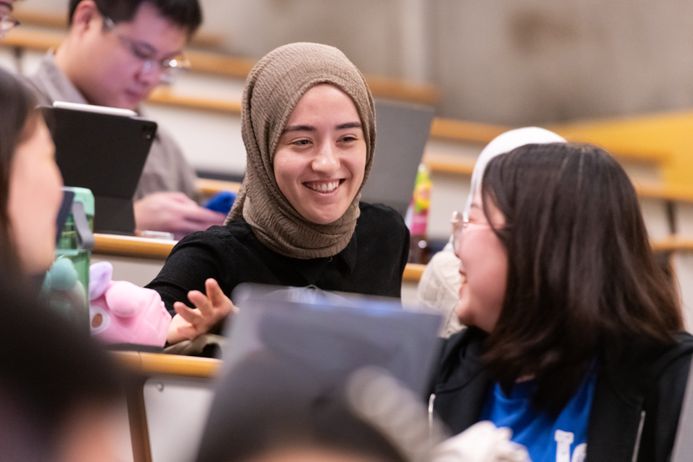 Students interacting in a lecture theatre
