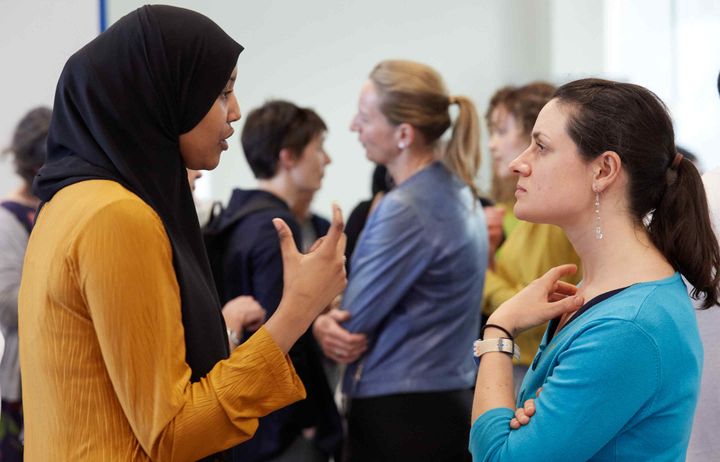 Two women talking