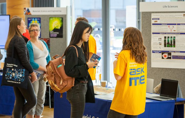 A student ambassador speaking to a visitor