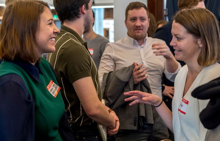 Students chatting at event 