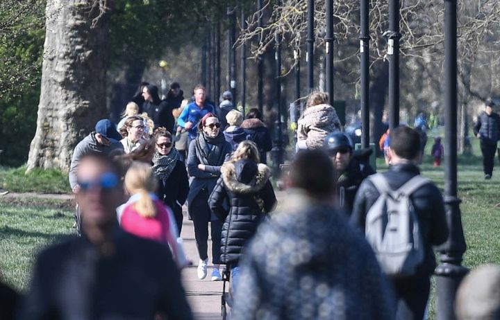 View of people walking through park