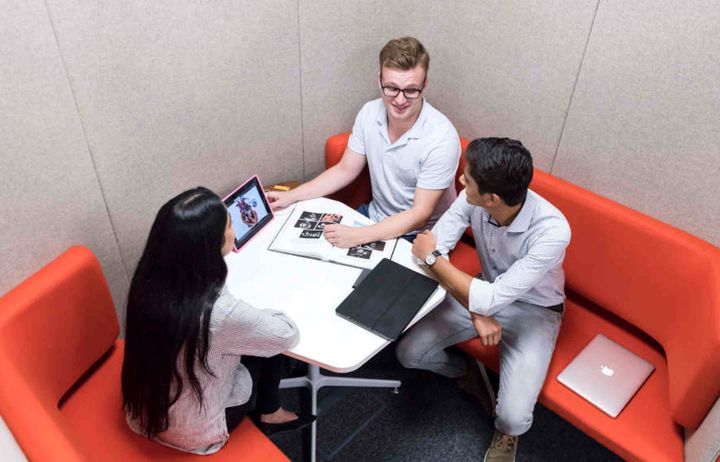 students sit and talk