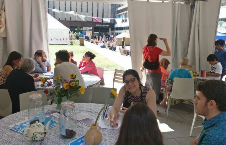 festival tent with participants 