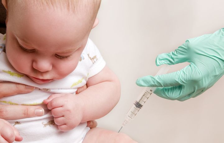 Baby receiving an injection