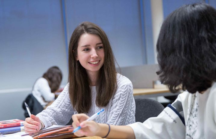 Smiling and studying 