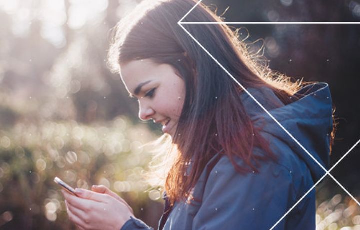 Young woman looking at a mobile phone