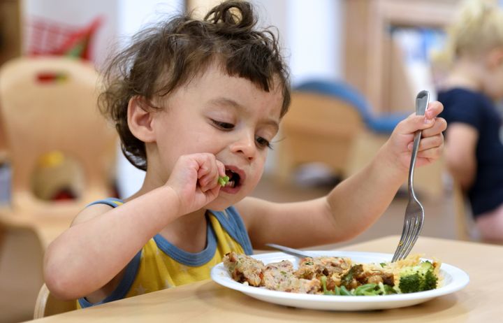 Child eating healthy food