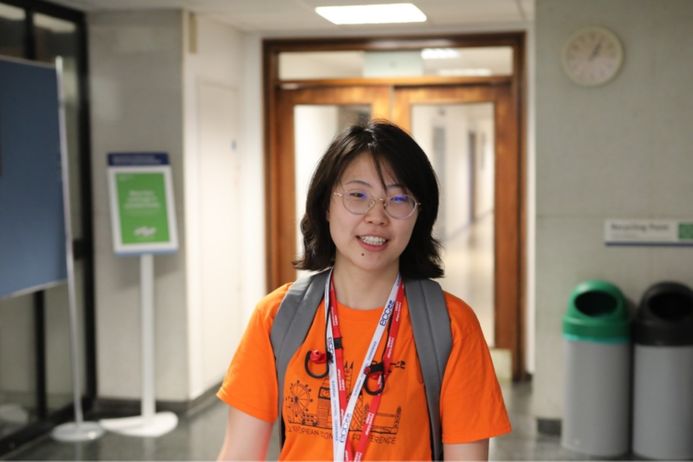 portrait of a female student, wearing glasses