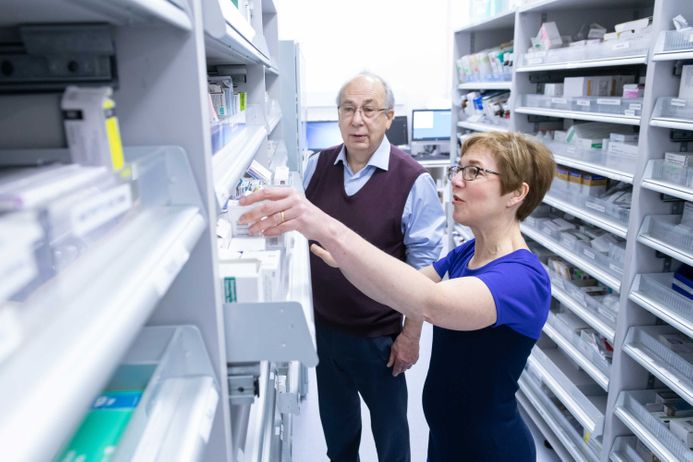two people in a pharmacy