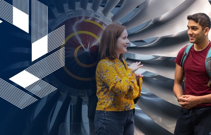 IBP logo with two people in front of a turbine