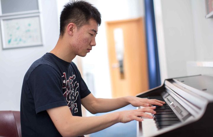 student playing piano