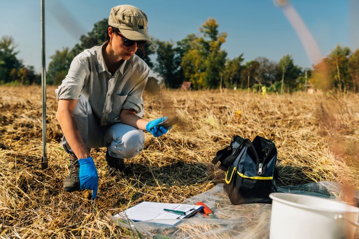 Woman testing soil