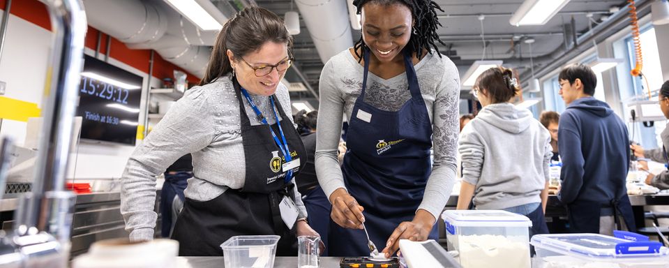 Two people learning in the Chemical Kitchen