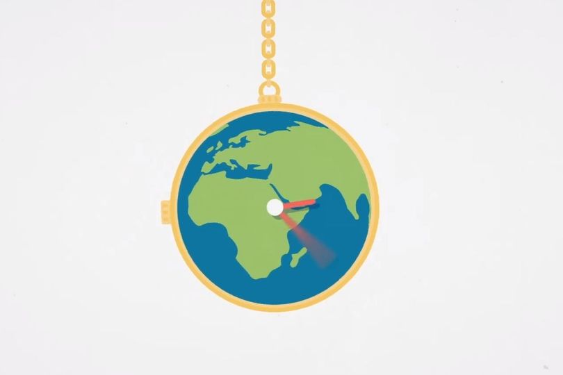Globe in the form of a pocket watch swinging like a pendulum