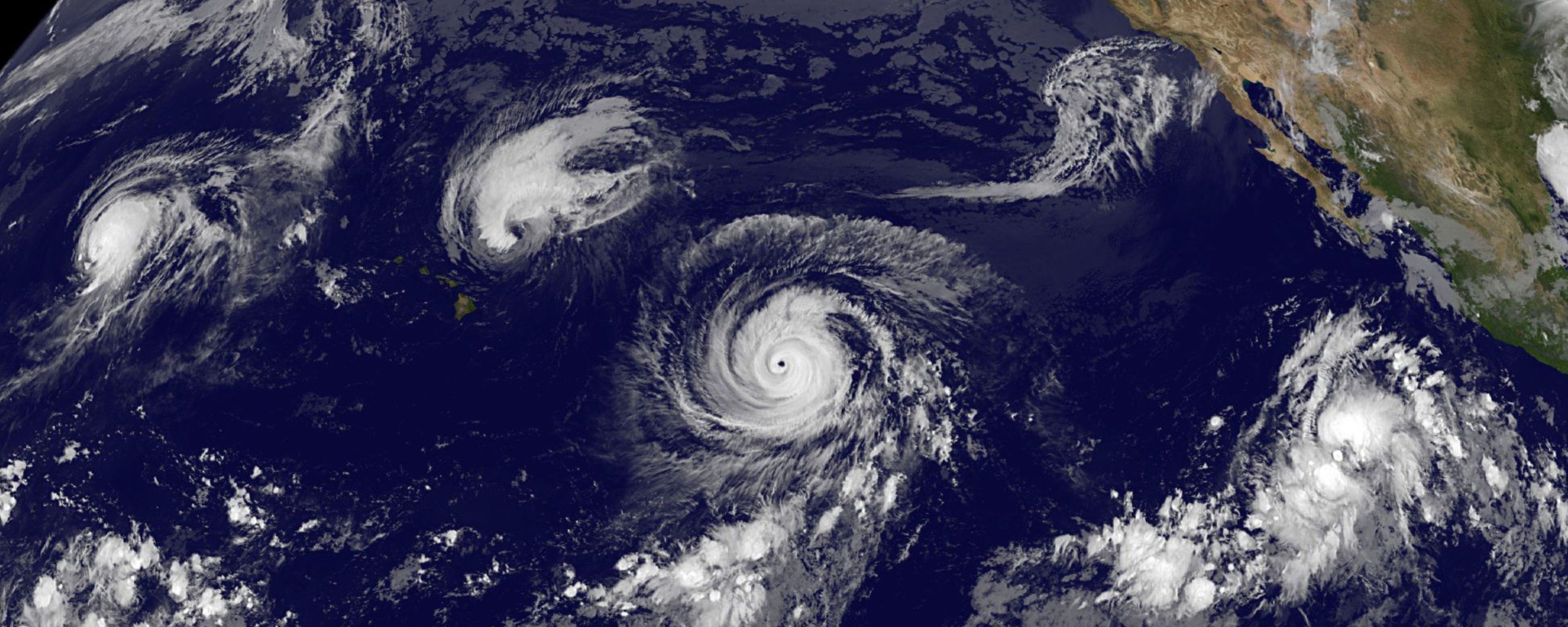 Aerial View of Four Tropical Cyclones Across the Entire Pacific Ocean