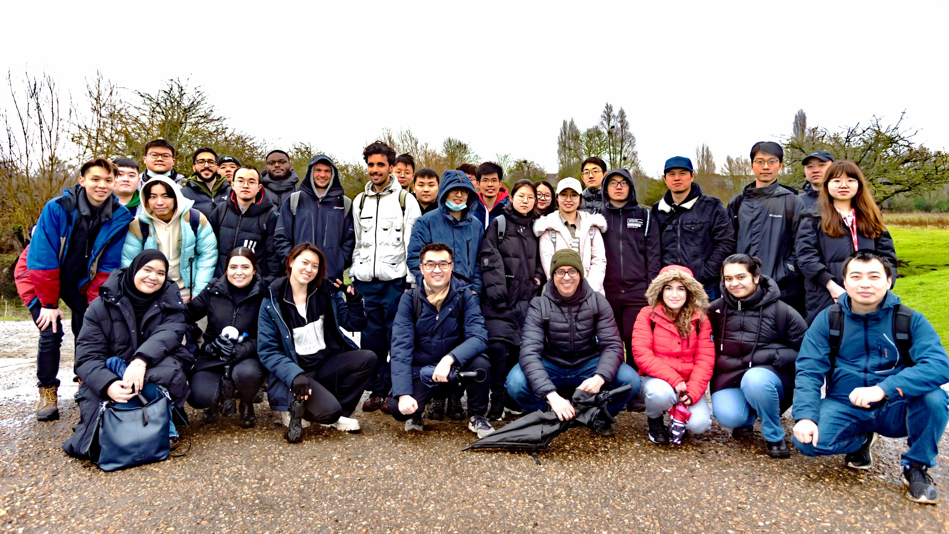 A group photo of MSc students on a field trip to a FRP bridge in Oxford