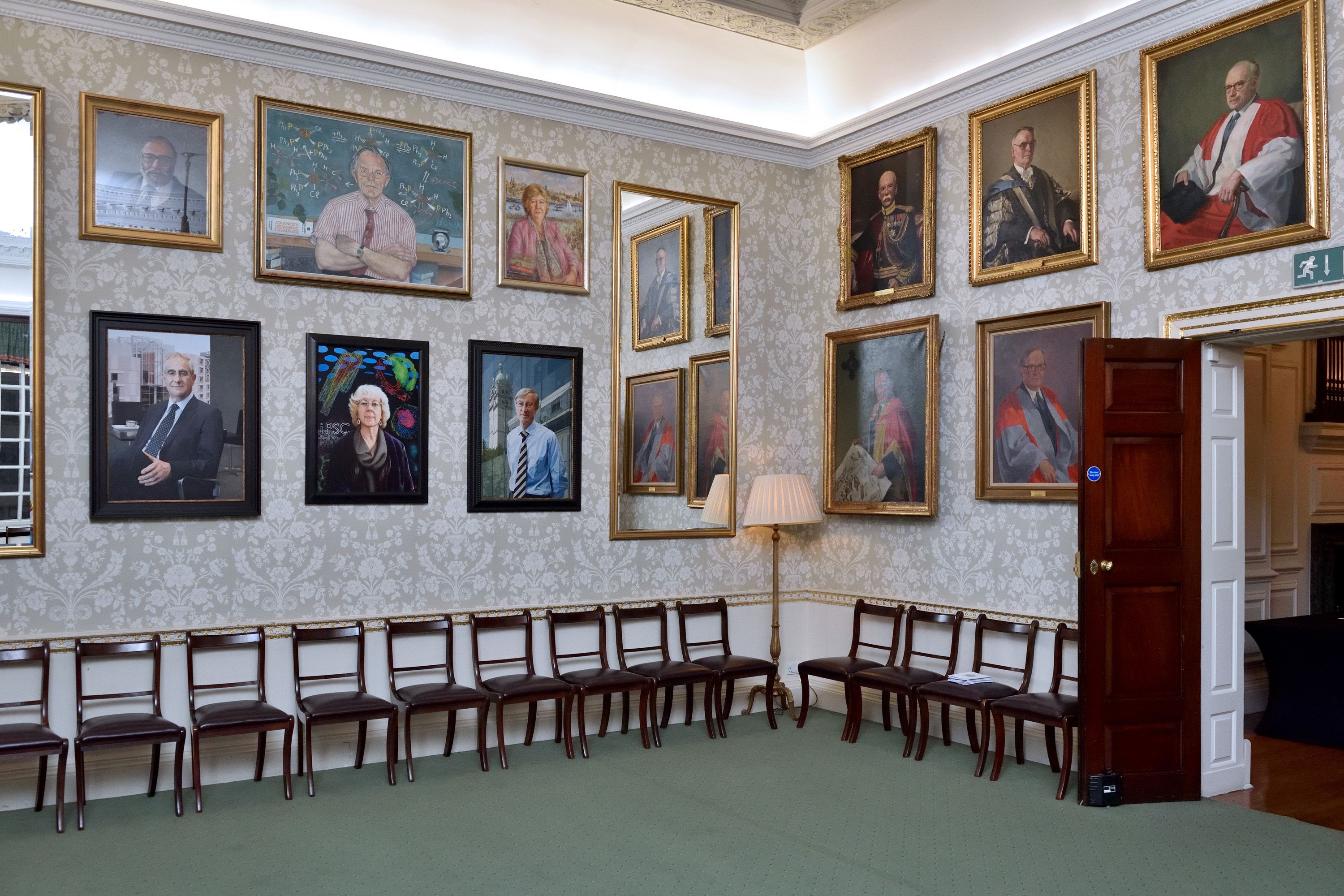 A selection of painted portraits in the Council Room