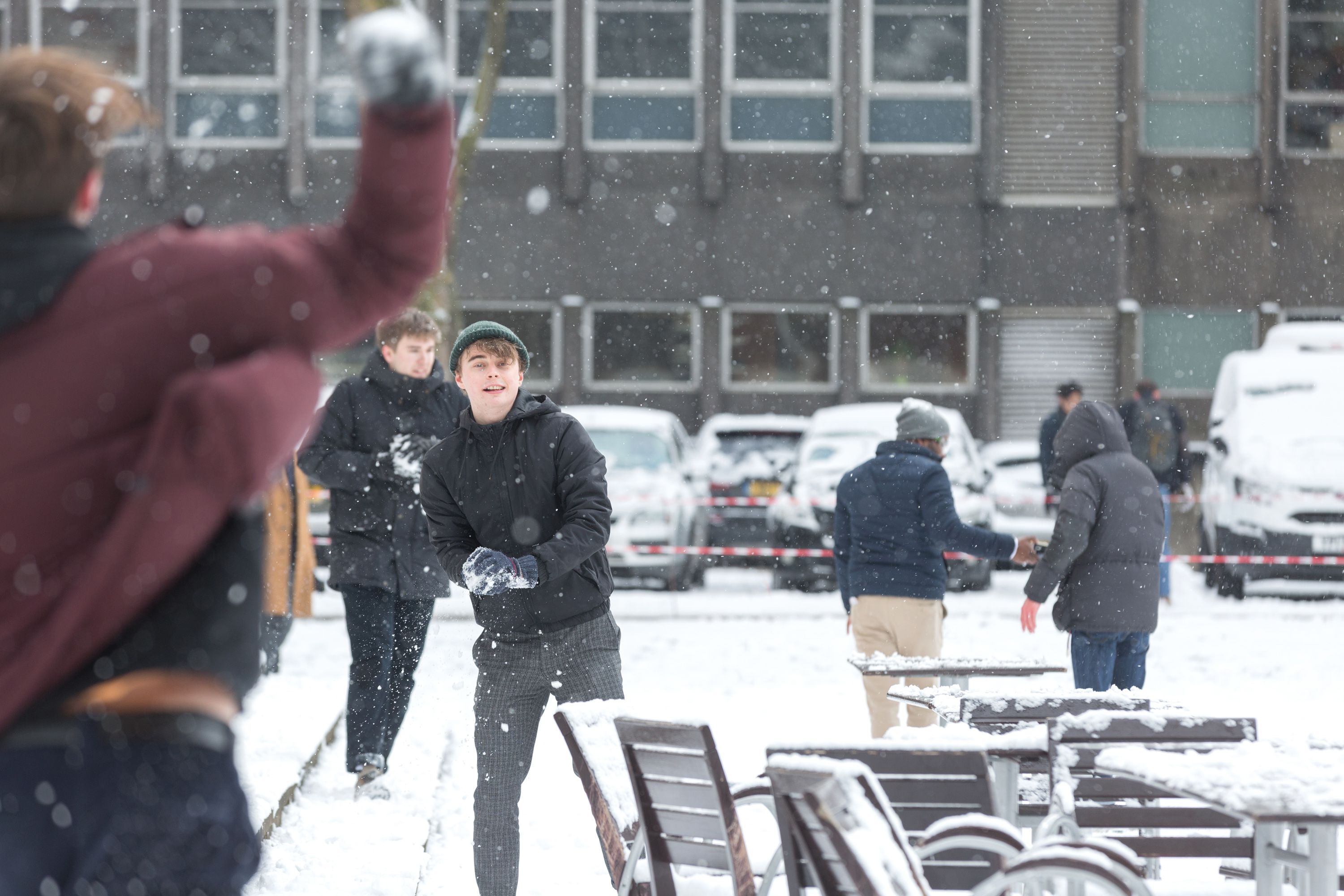 Students having a snowball fight on the South Kensington Campus
