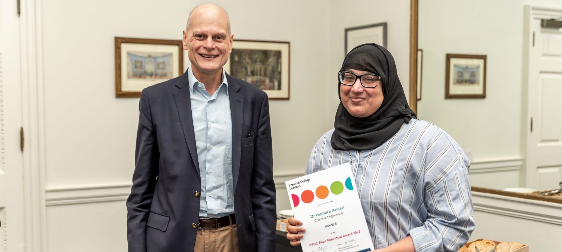 Humara Ansari receiving her certificate from the Provost