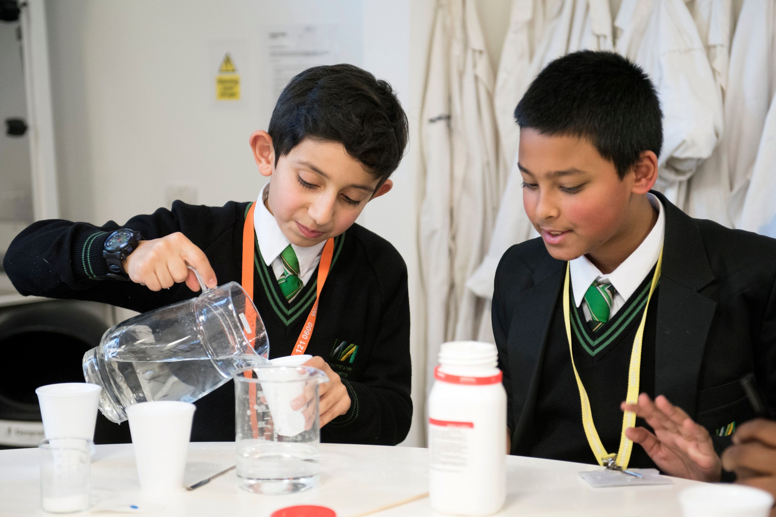 Two Westminster Academy pupils participating in a Science Magic workshop in the Wohl Reach Out Lab