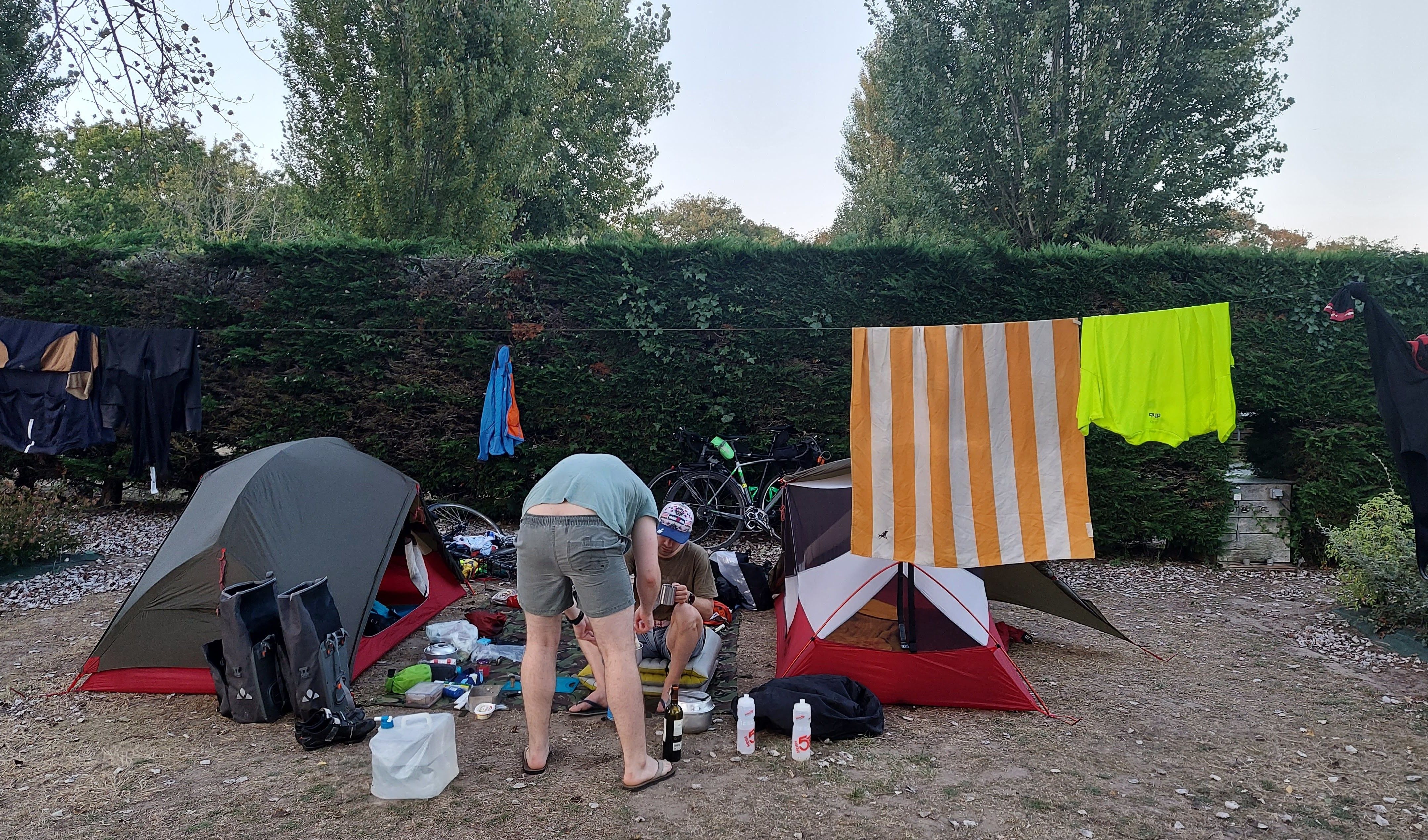 Students on campsite with bikes