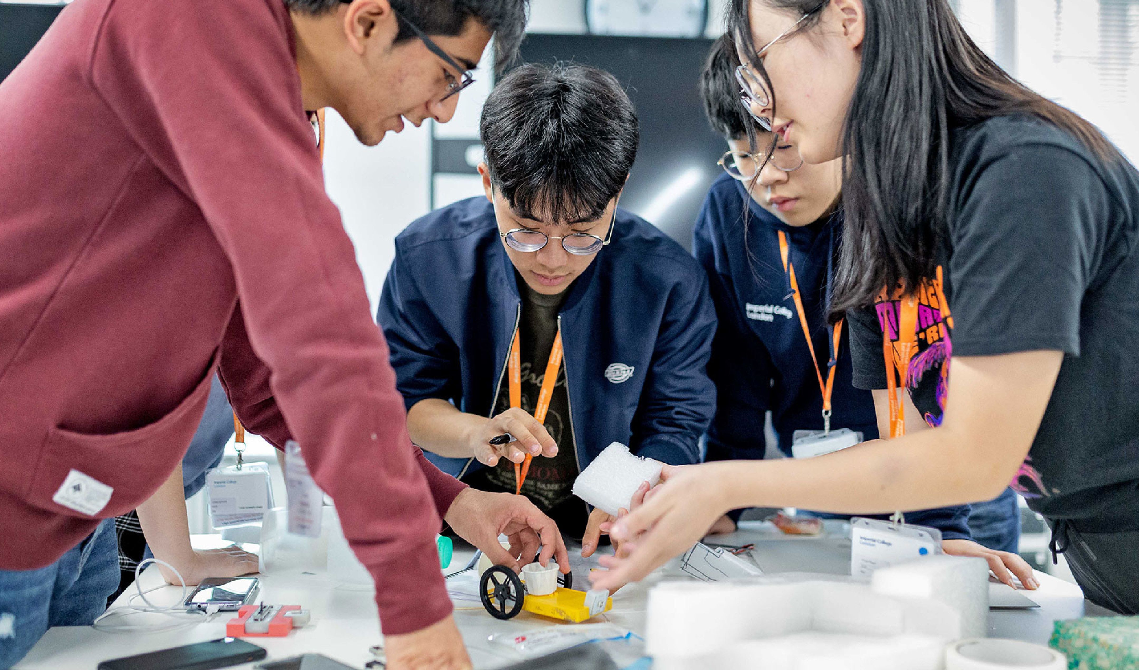 Students building a second prototype robot