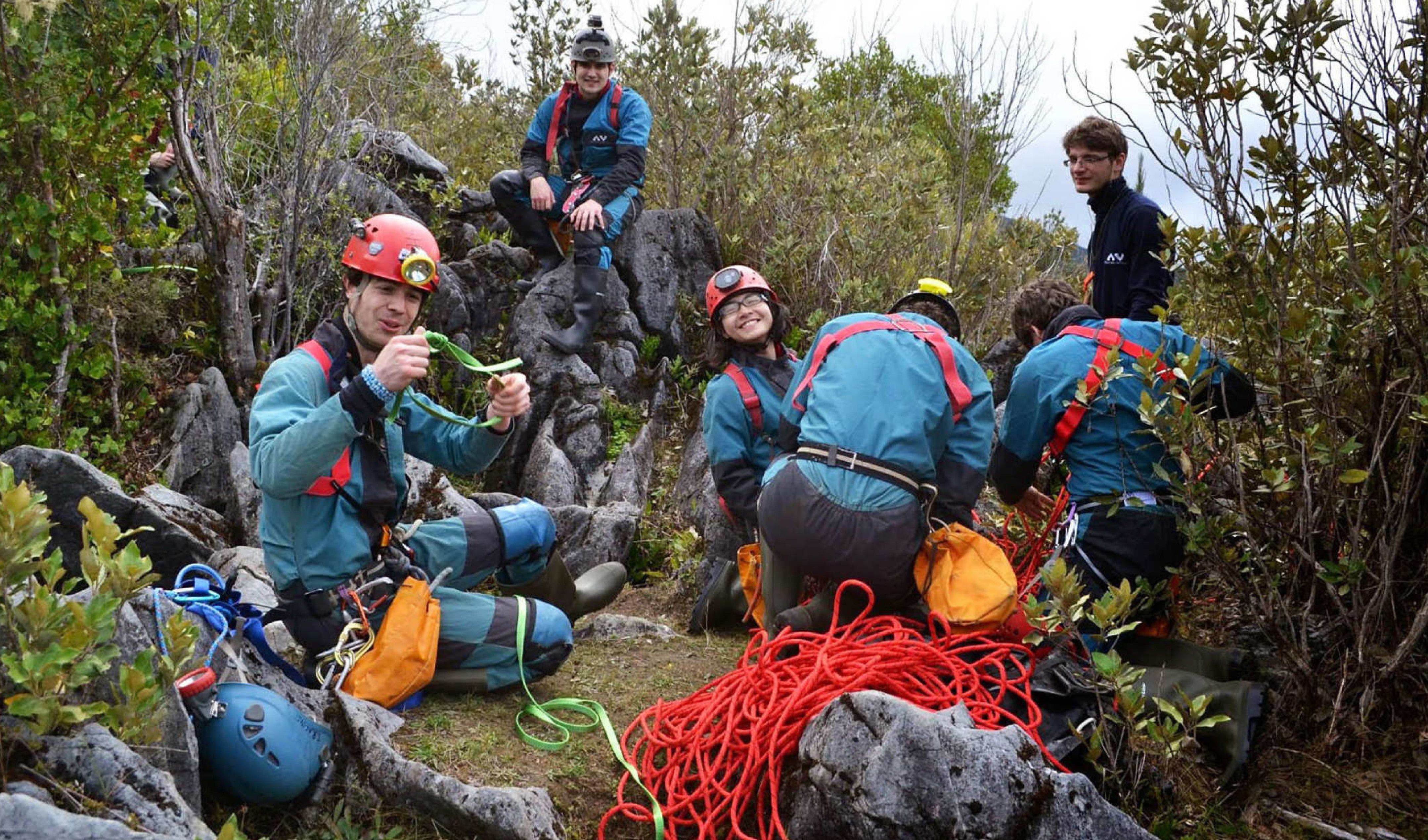 A group of students preparing to go caving