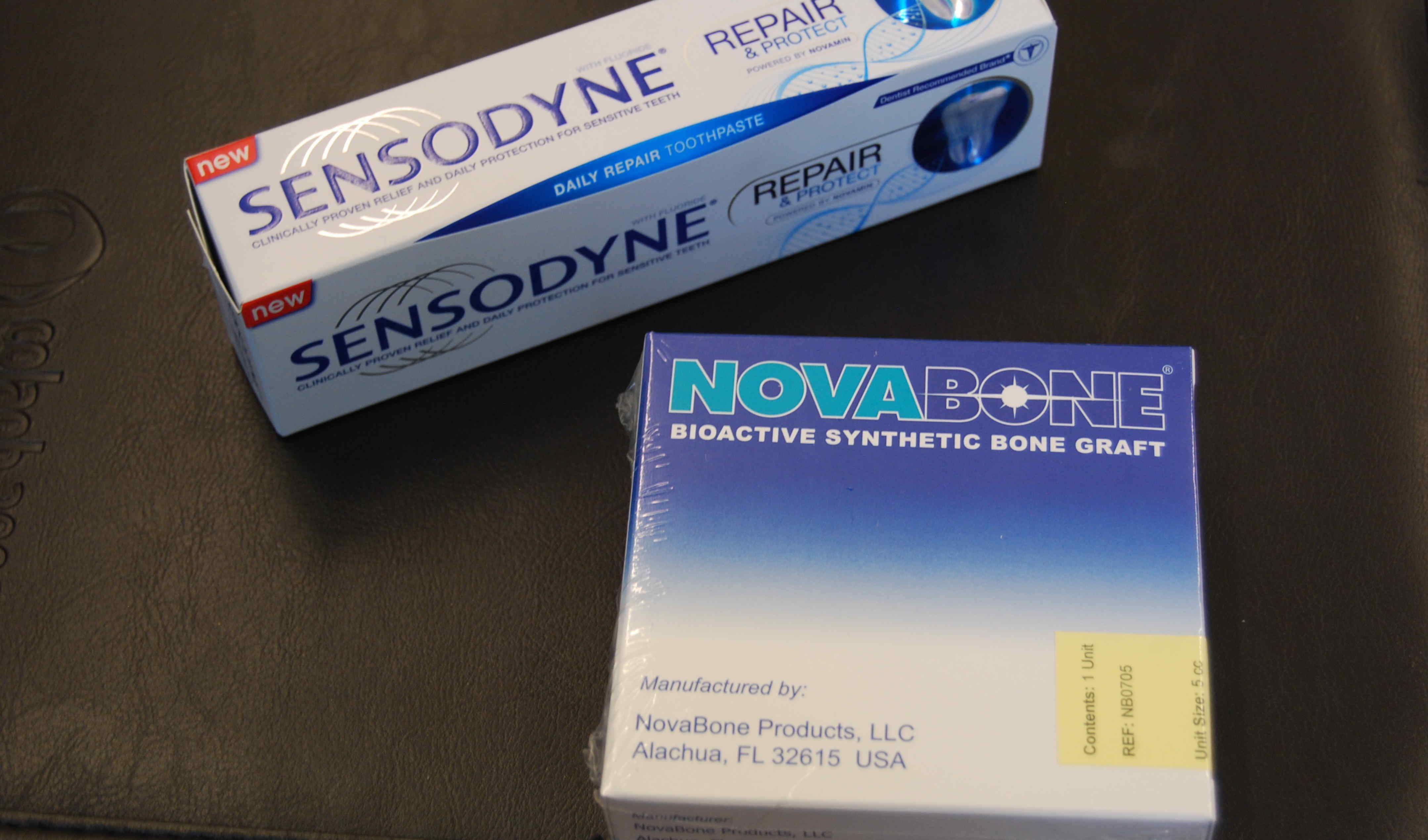 Tooth paste box next to Novabone box