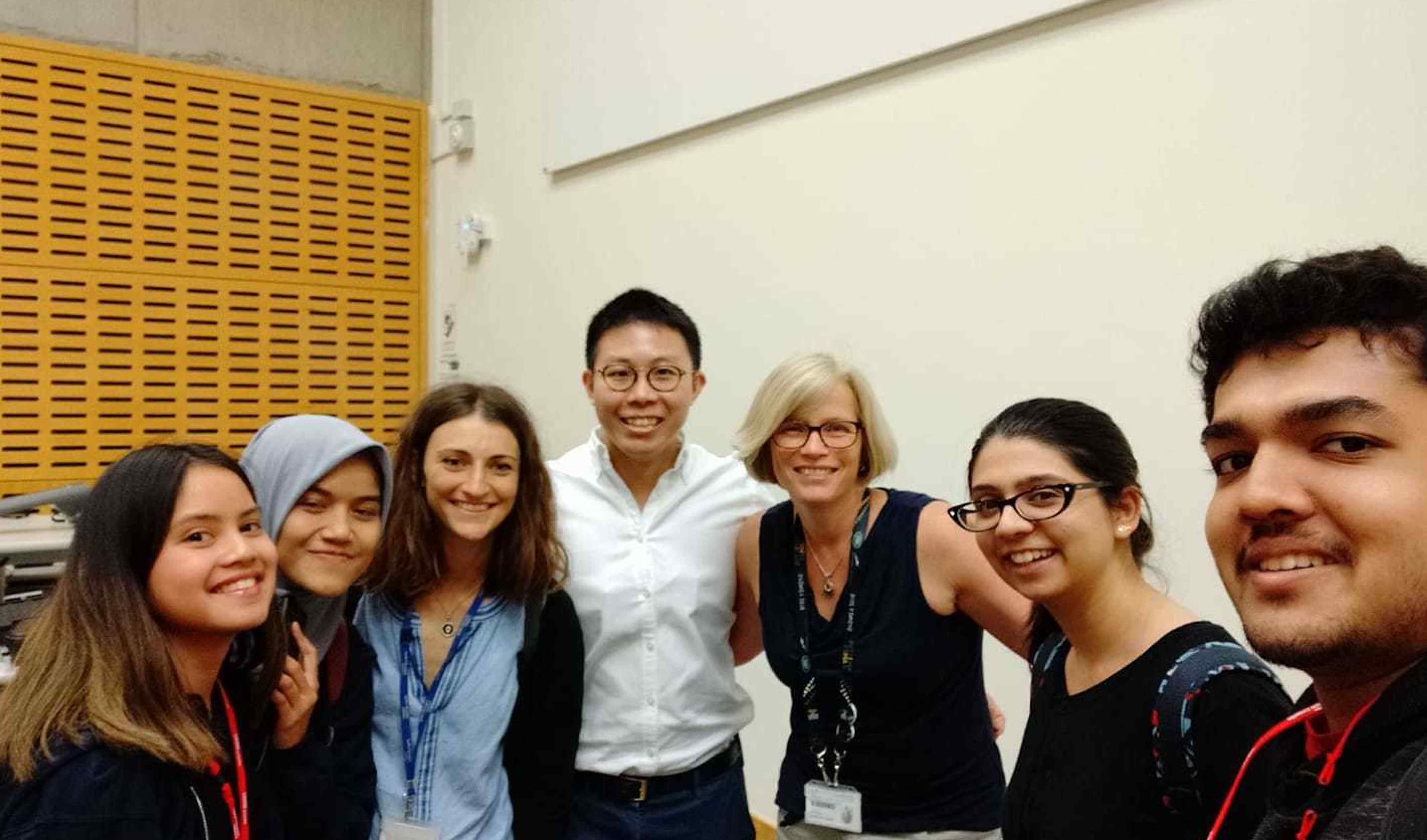 A group photo taken after a guest speakers lecture  